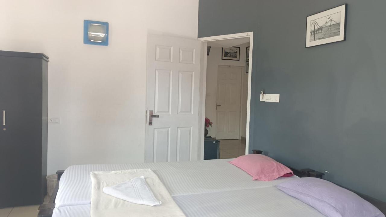 Апартаменти Nest Kochi Номер фото